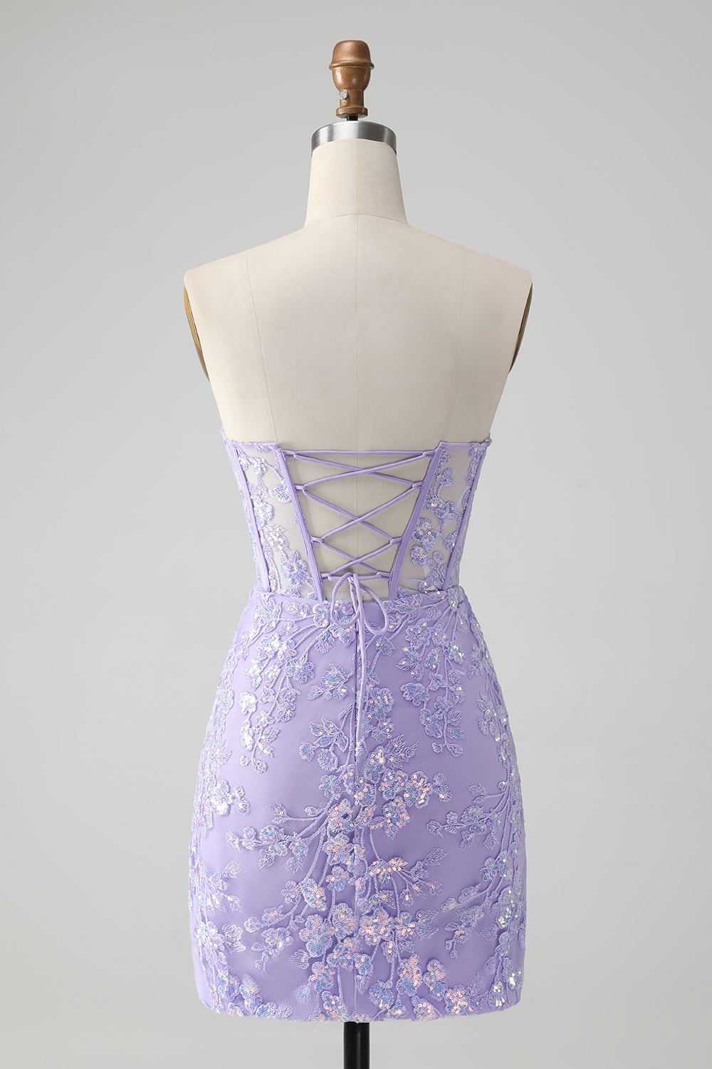 Vestido de cóctel con lentejuelas y espalda con cordones y corsé lila