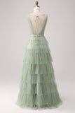 Vestido de fiesta verde plisado escalonado con abertura