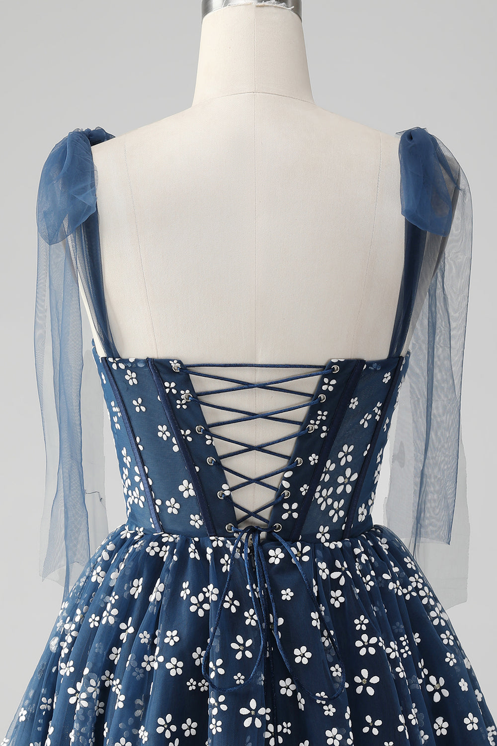 Vestido de cóctel corto con corsé estampado y tirantes finos azul marino