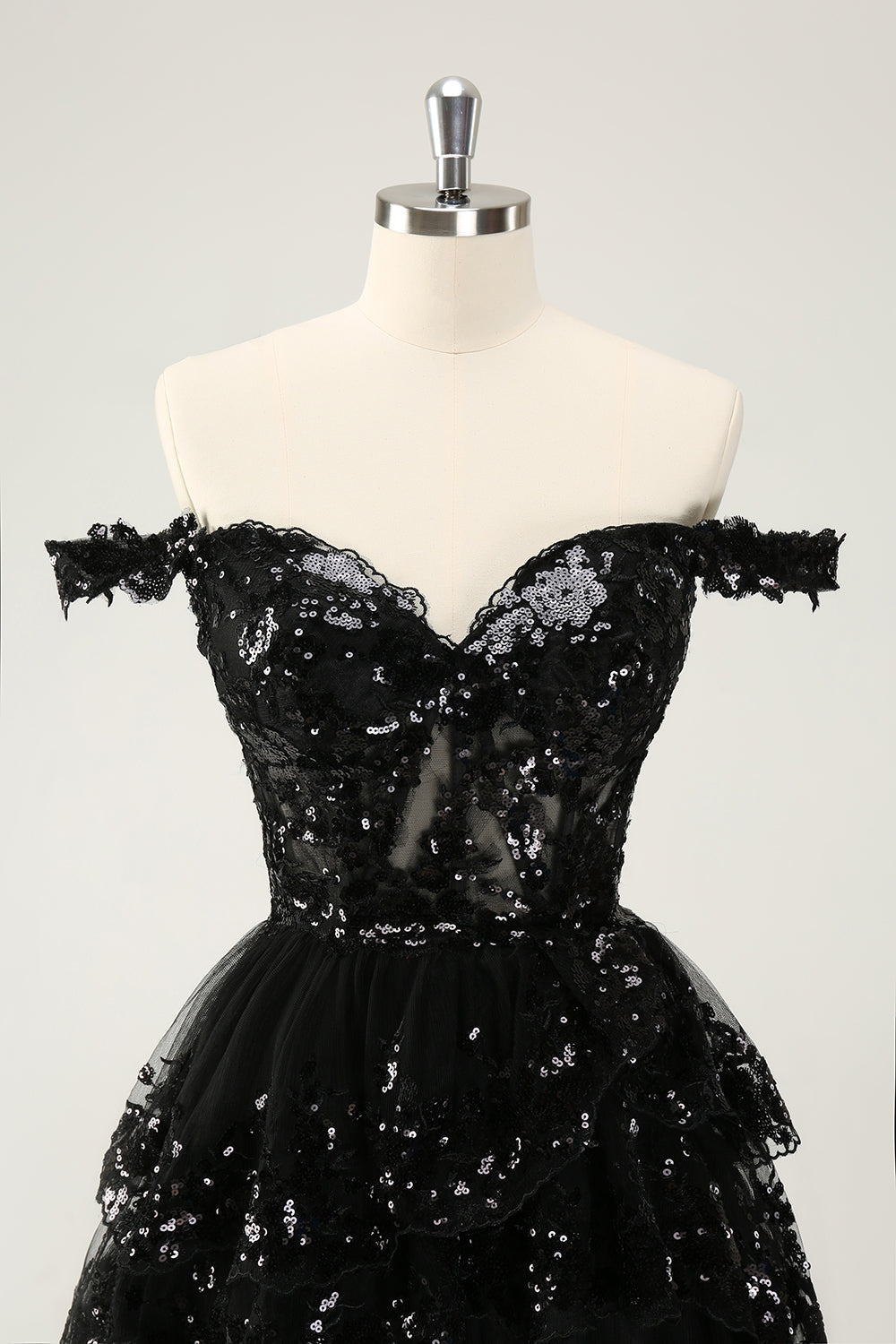 Vestido de cóctel de encaje con corsé escalonado y hombros descubiertos en negro brillante