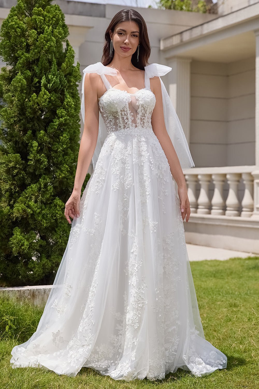 Vestido de novia corsé de tul con cordones blanco princesa con apliques