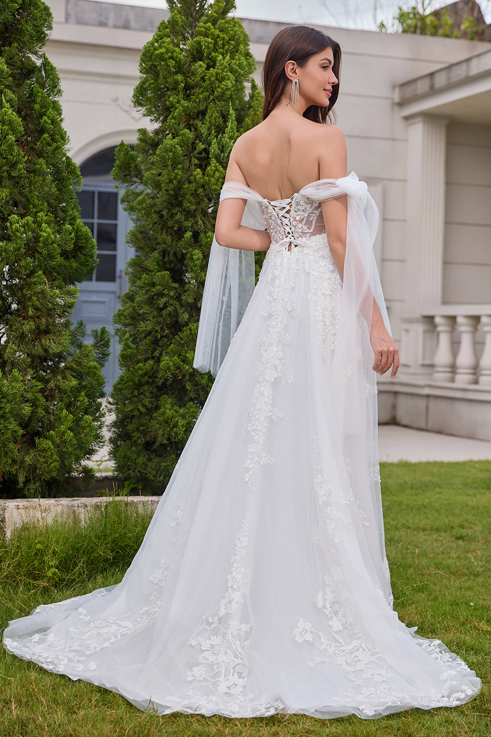 Vestido de novia corsé de tul con cordones blanco princesa con apliques