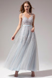Vestido gris con apliques