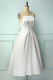 Vestido a media pierna con tirantes finos blancos
