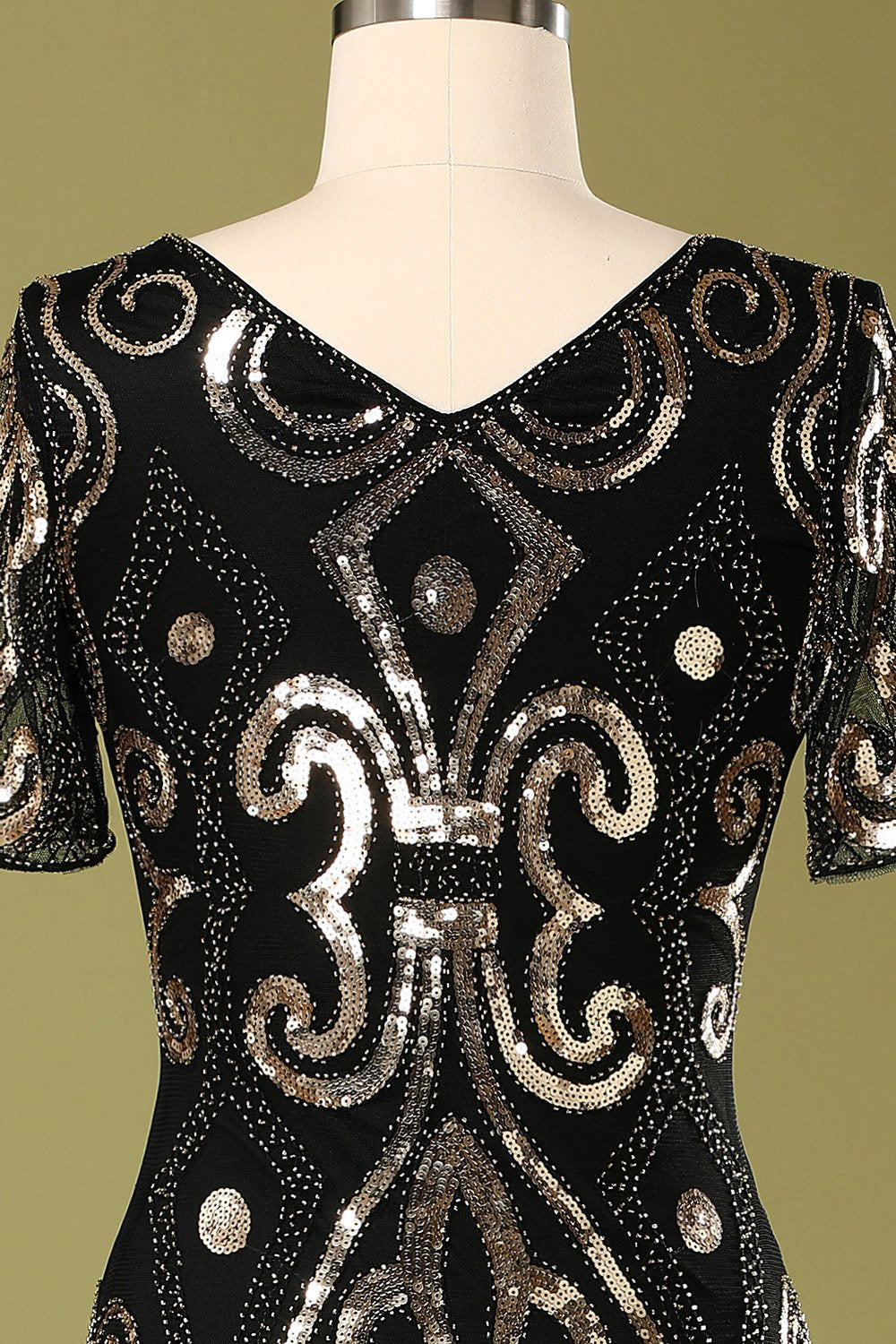 Vestido de aleta de lentejuelas negras de los años 20