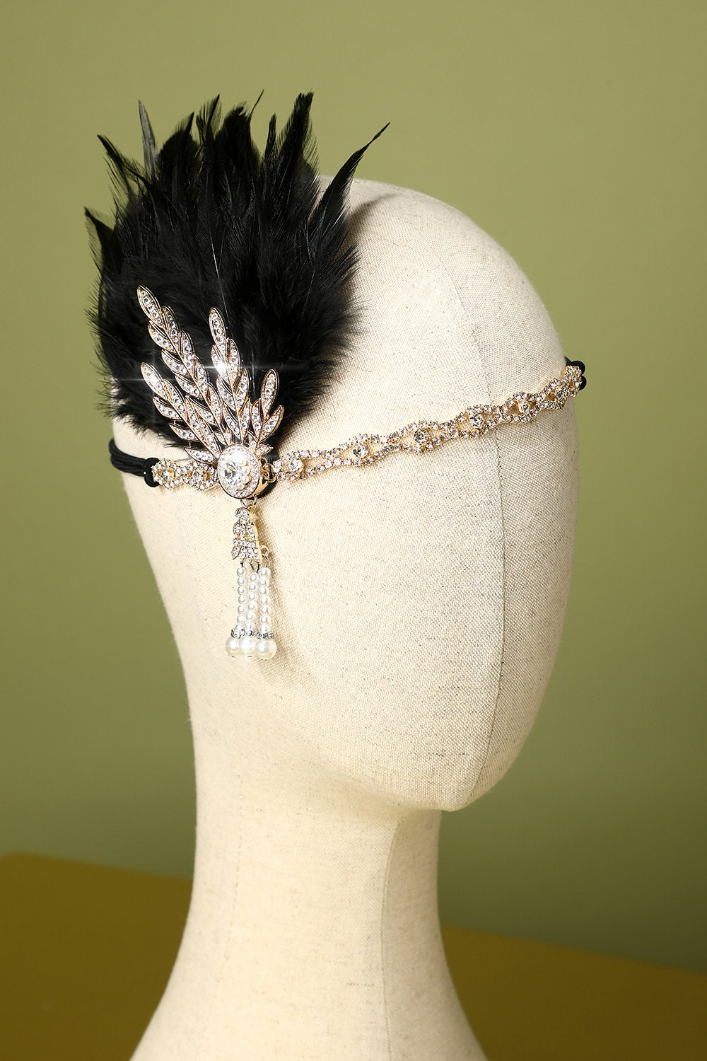 Diadema de plumas negras con cuentas de los años 20