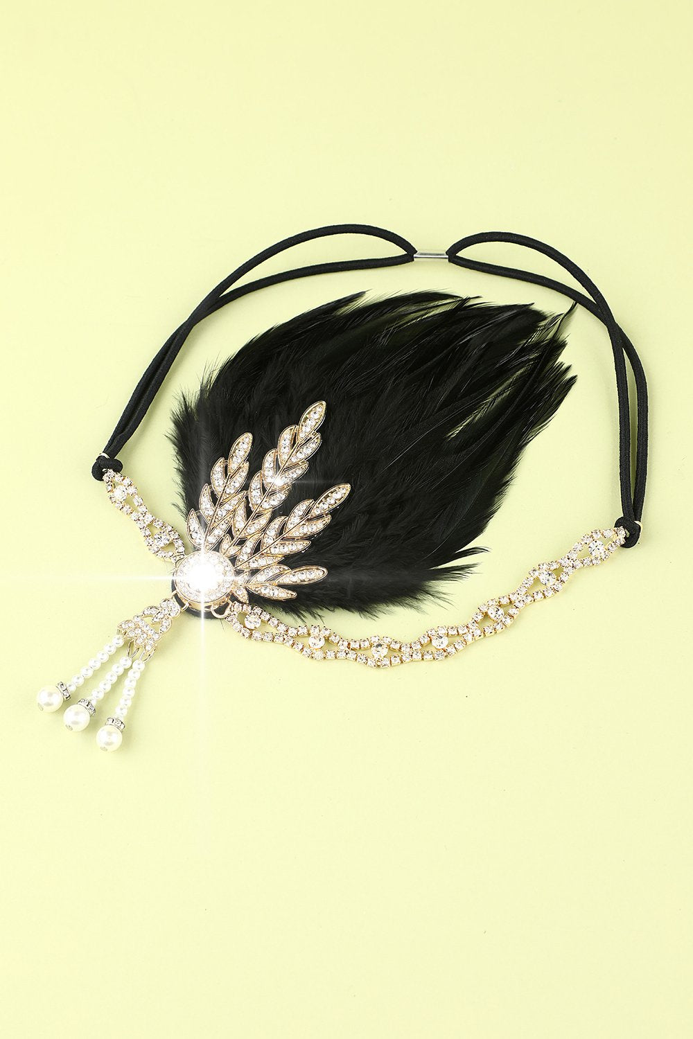 Diadema de plumas negras con cuentas de los años 20