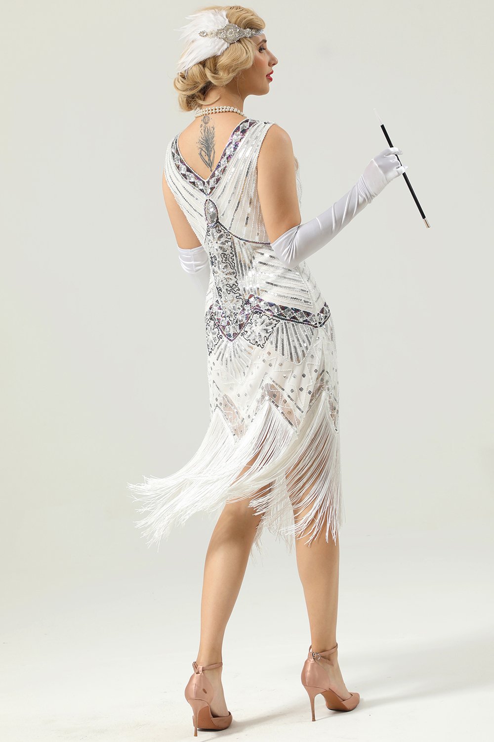 Vestido de lentejuelas negras y doradas de la década de 1920