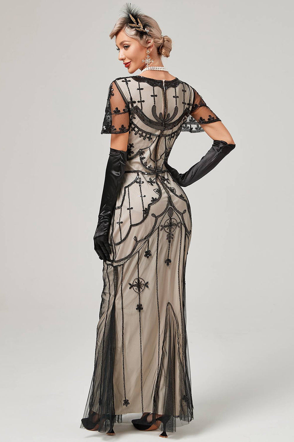 Vestido largo de lentejuelas de rubor negro de la década de 1920