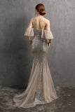 Vestido largo de lentejuelas de champán con volantes
