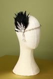 Diadema de plumas negras con cuentas de los años 20