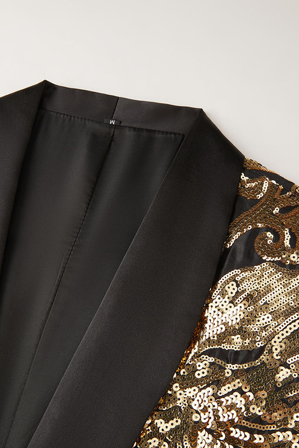 Blazer de lentejuelas doradas en forma de flor de hombre