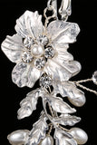 Clip de oreja nupcial de flor blanca