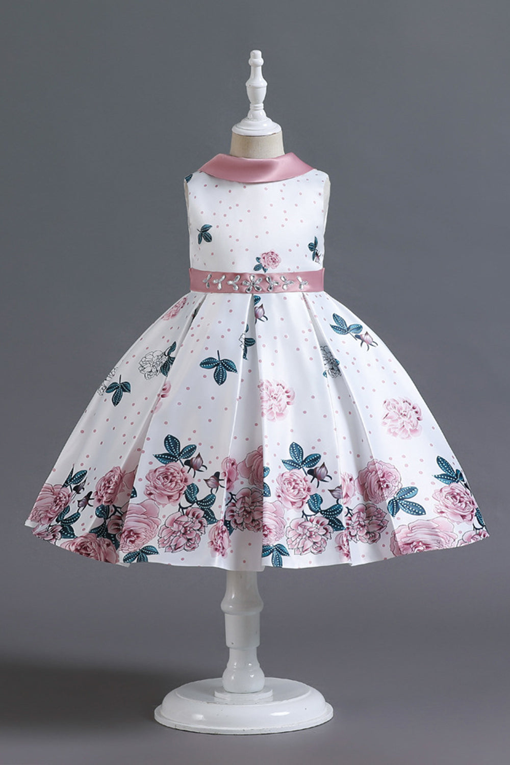 Una línea de cuello joya azul estampado vestido de niña