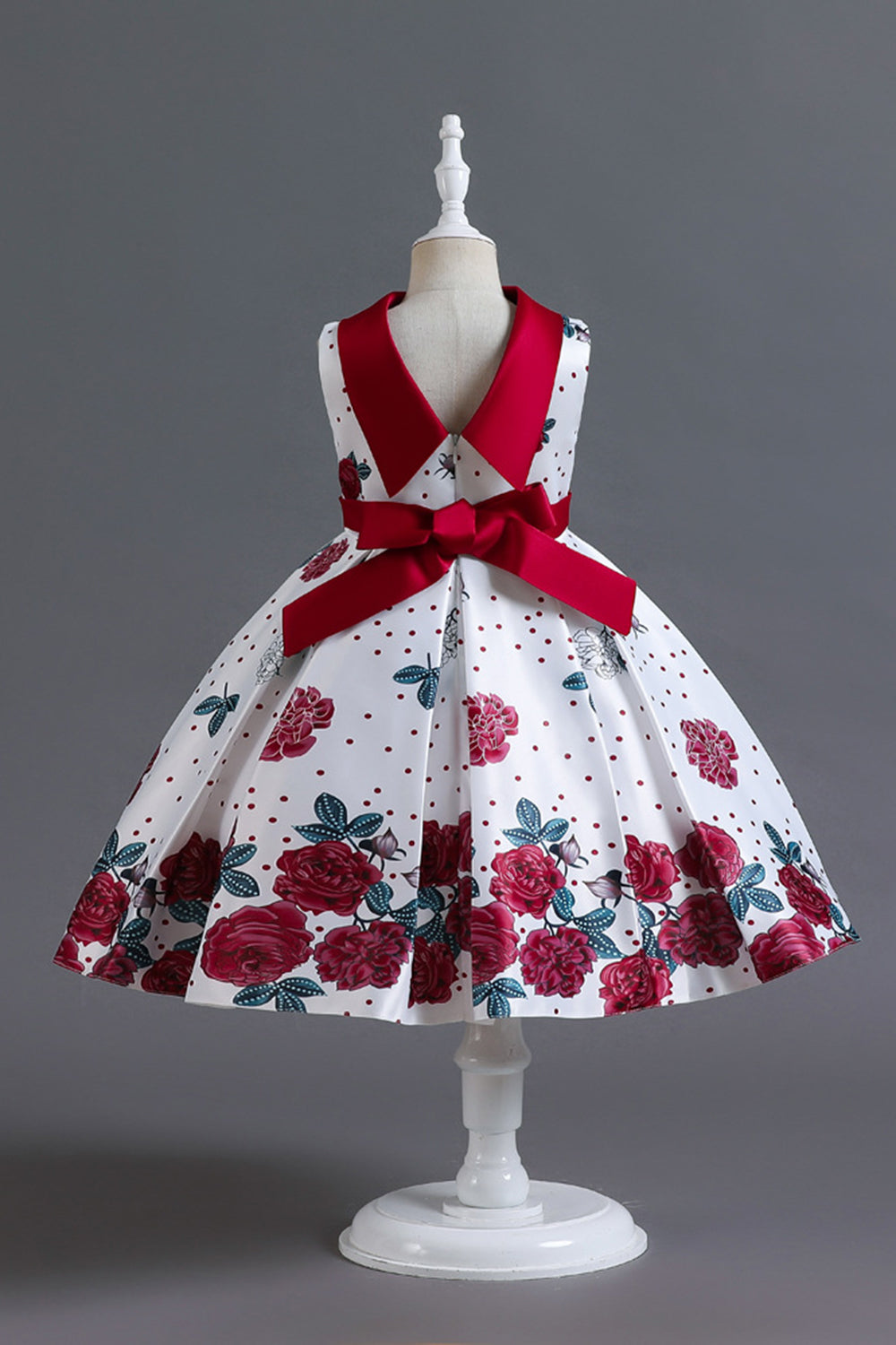 Una línea de cuello joya azul estampado vestido de niña
