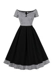 Vestido vintage negro a cuadros fuera del hombro con mangas cortas