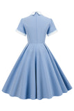Vestido vintage azul claro de la década de 1950 con mangas