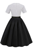 Vestido de lunares blancos y negros Vintage de la década de 1950