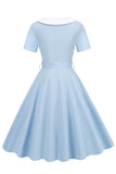 Vestido swing negro de la década de 1950 con cinturón