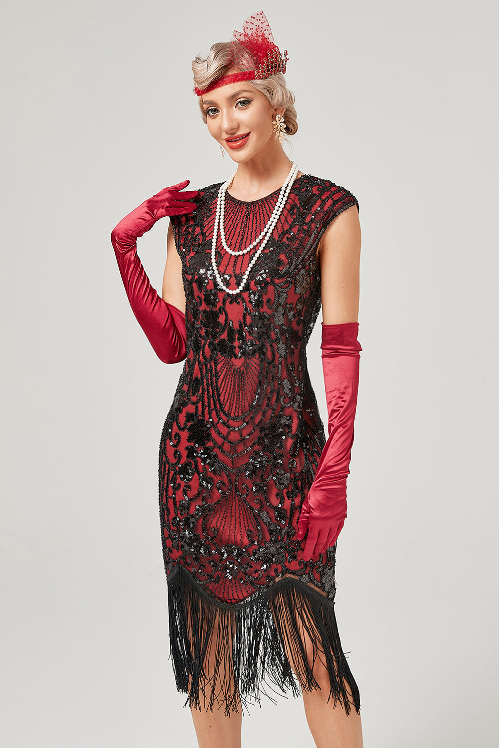 Vestido verde de cuello redondo dorado bordado de la década de 1920 con flecos