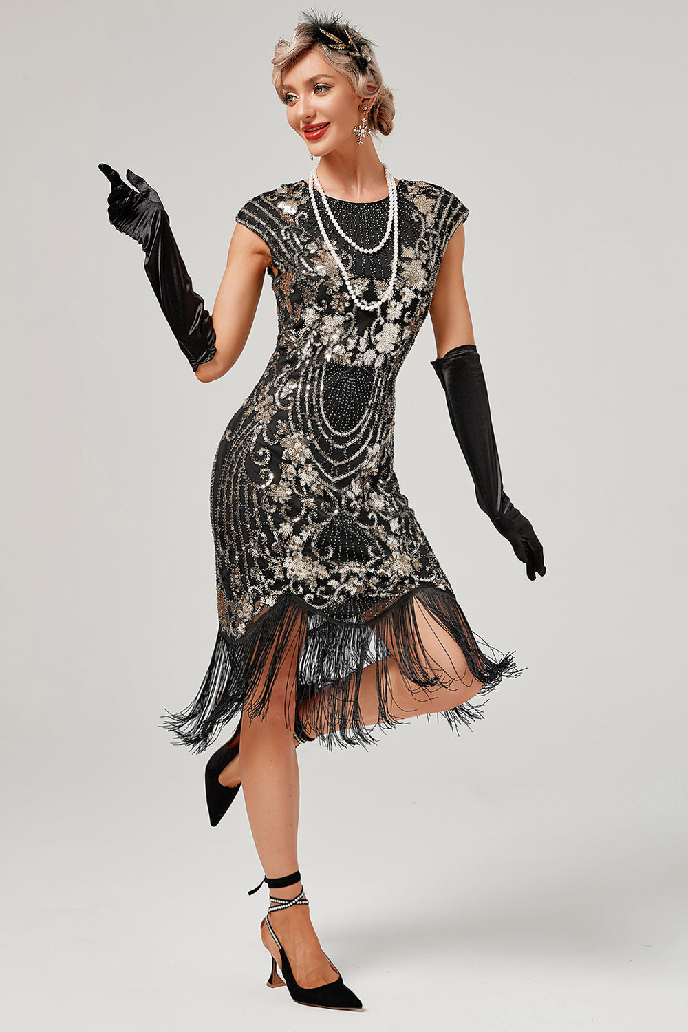 Vestido verde de cuello redondo dorado bordado de la década de 1920 con flecos