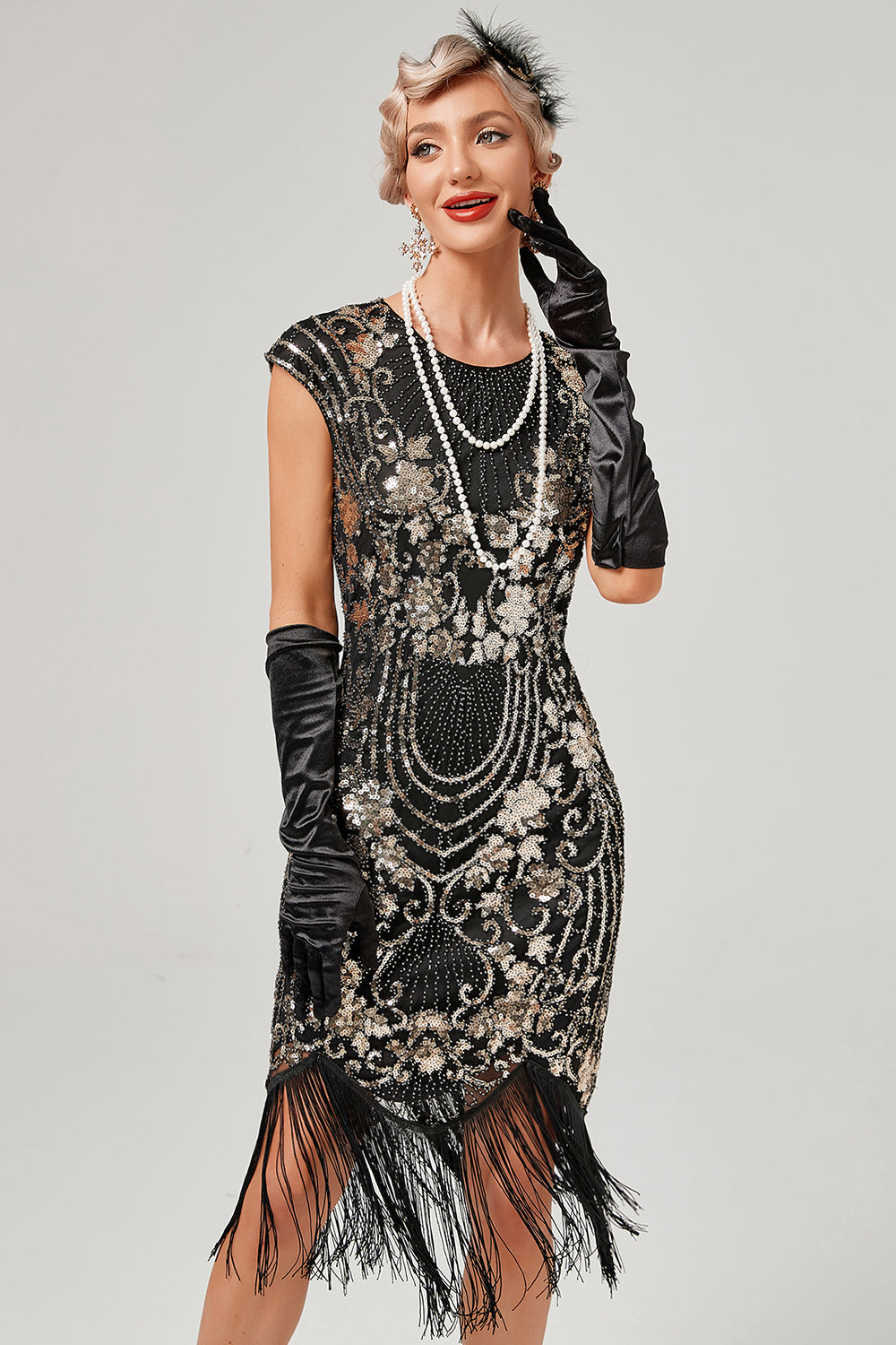 Vestido verde de cuello redondo dorado bordado de la década de 1920 con flecos