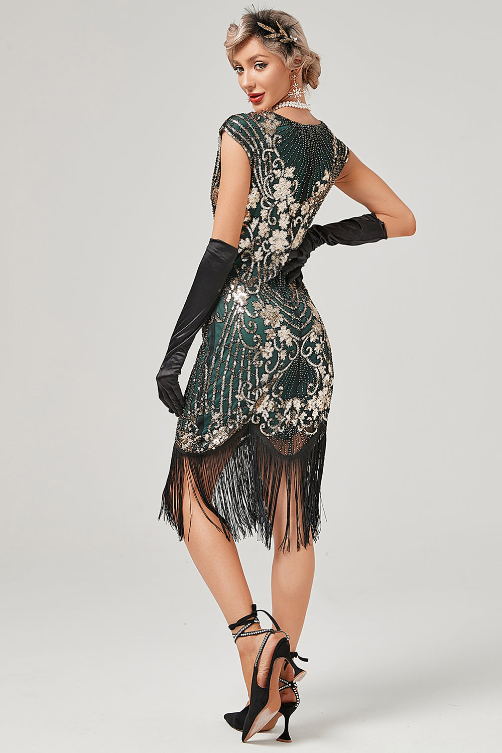 Vestido verde de cuello redondo dorado bordado de la década de 1920 con flecos