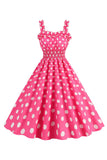 Lunares rosas Una línea de vestido de la década de 1950