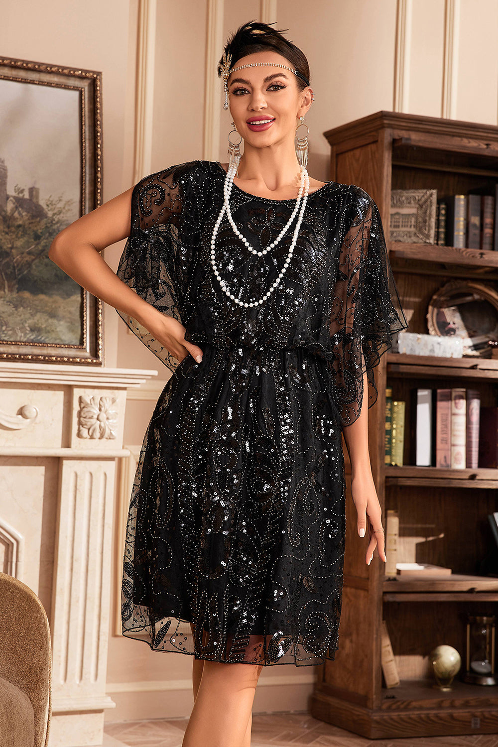 Vestido de lentejuelas negras con mangas de murciélago de la década de 1920