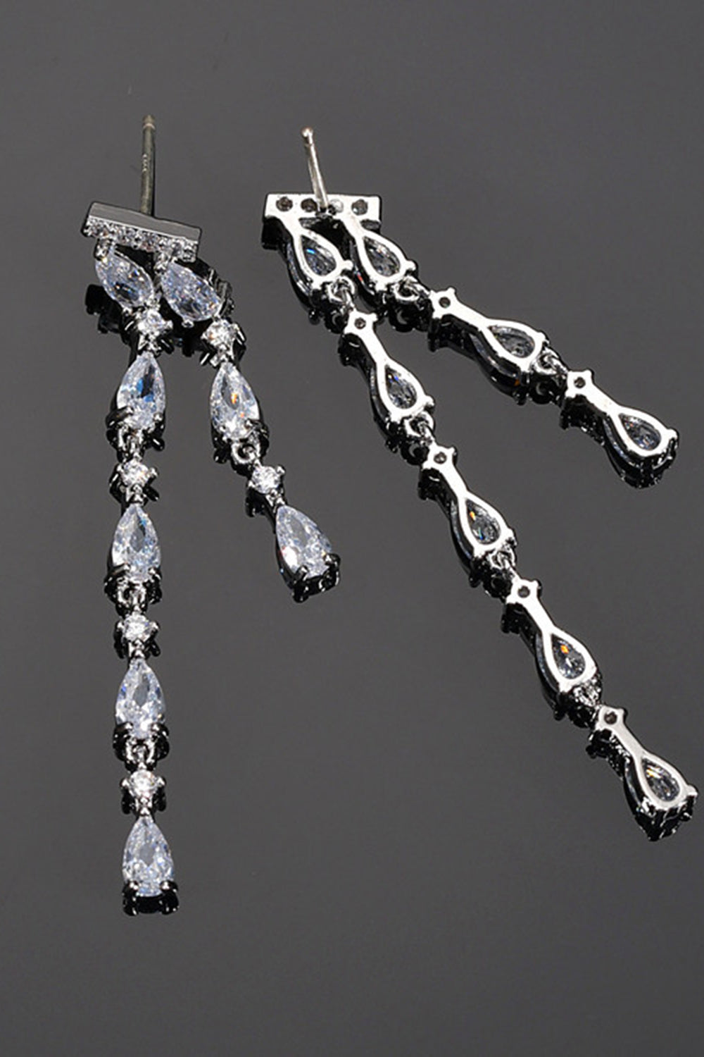 Pendientes largos de pedrería rosa