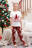Pijama navideño a juego familiar con cuadros rojos