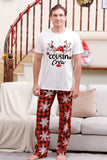Pijama navideño a juego familiar con cuadros rojos