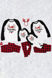 Pijama a cuadros navideños a juego con estampado familiar