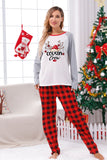 Pijama a cuadros navideños a juego con estampado familiar