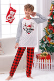Pijama a cuadros navideños a juego con estampado familiar
