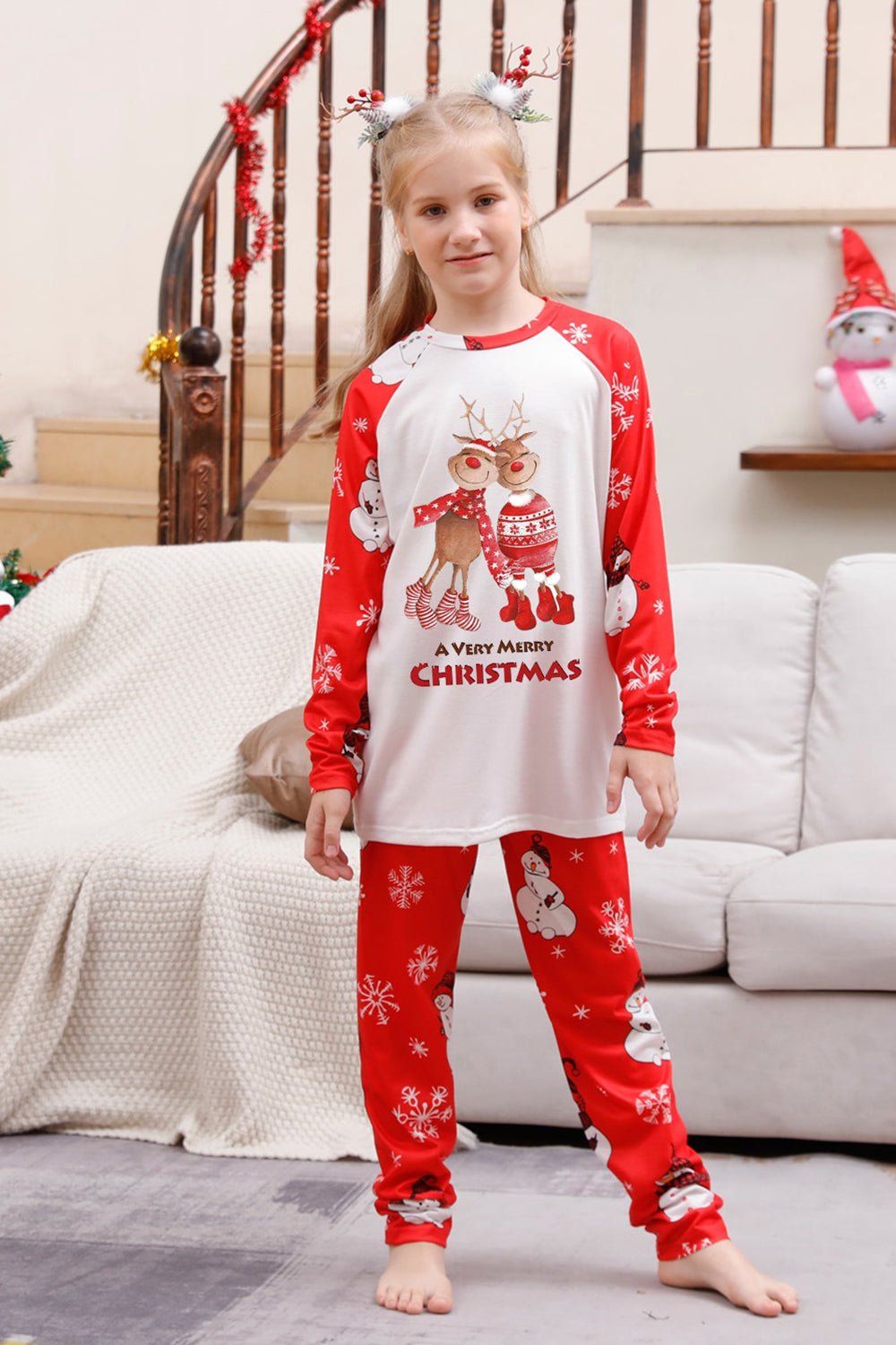 Pijama familiar a juego navideño rojo con estampado de muñeco de nieve