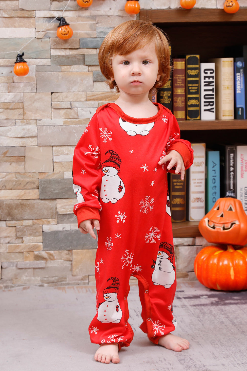 Pijama familiar a juego navideño rojo con estampado de muñeco de nieve