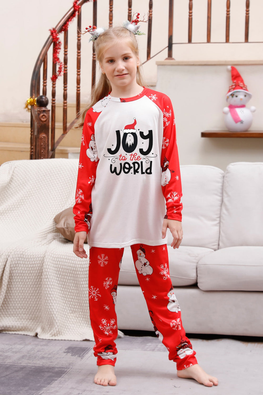 Pijama familiar a juego navideño rojo con estampado de muñeco de nieve