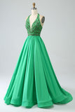 Vestido de fiesta halter verde satinado con abalorios