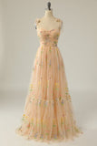 Vestido largo de fiesta bordado con champán
