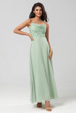 Certificablemente elegante A Line Spaghetti Straps Dusty Pink Long Bridesmaid Dress con cuentas