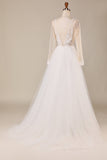 Una línea profunda V-Neck Ivory Tulle Sweep Train Wedding Dress con encaje