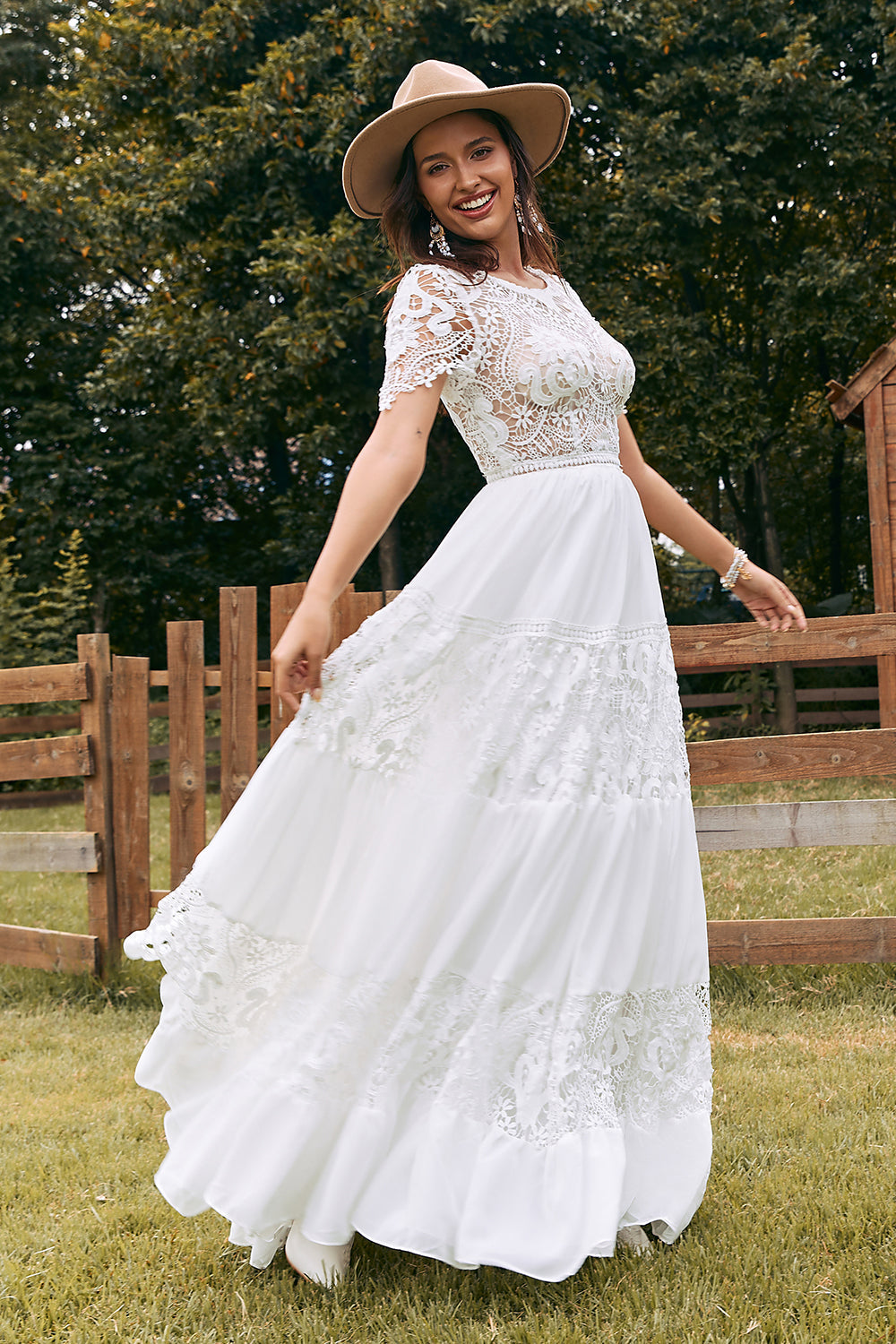 Vestido de novia de gasa boho de manga corta marfil con encaje