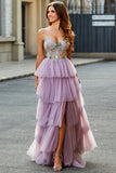 Vestido de fiesta malva con corsé largo evasé de tul con apliques