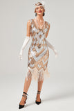 Vestido de lentejuelas doradas de la década de 1920 con flecos