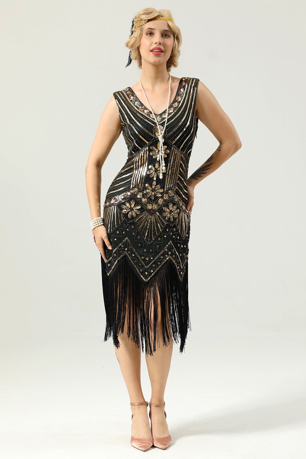 Vestido de lentejuelas negras y doradas de la década de 1920