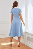 Vestido swing azul de la década de 1950 con bolsillos