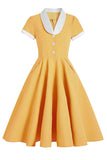 Vestido swing azul de la década de 1950 con bolsillos
