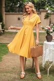 Elegante vestido vintage de cuello V amarillo