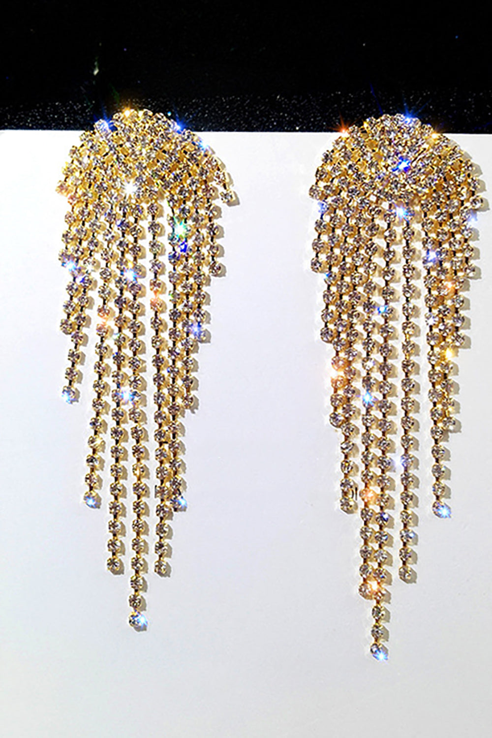 Pendientes colgantes de pedrería de oro